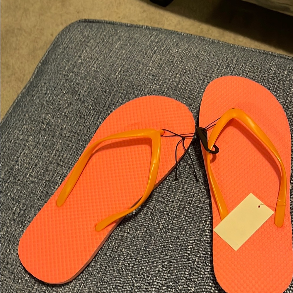 Vibrant Orange Flip Flops